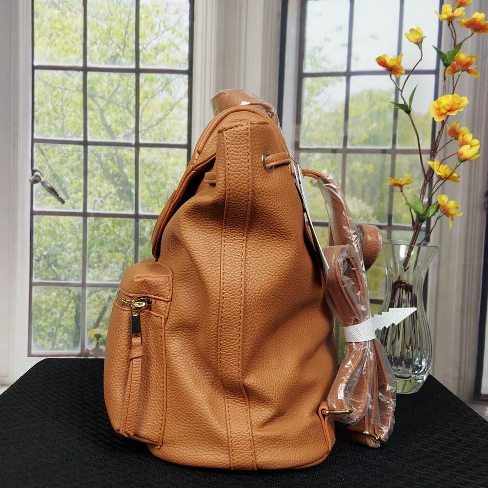 NWT JUSTFAB UTILITY BACKPACK (CASHEW)